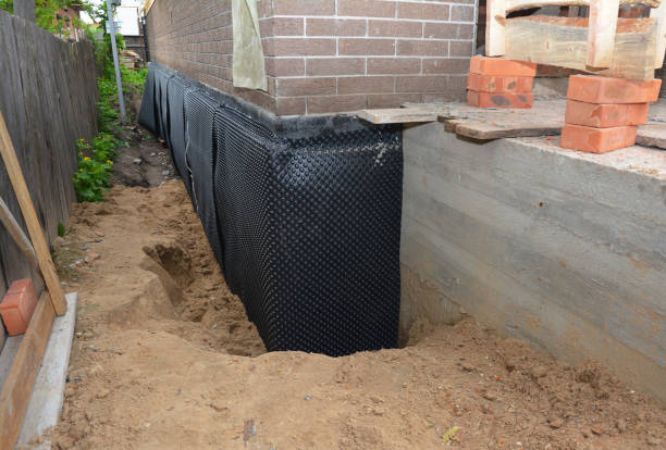 Happy homeowners after waterproofing job in Fanwood